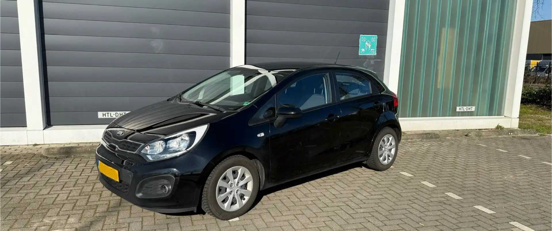 Kia Rio 1.2 CVVT ComfortL. Schwarz - 1