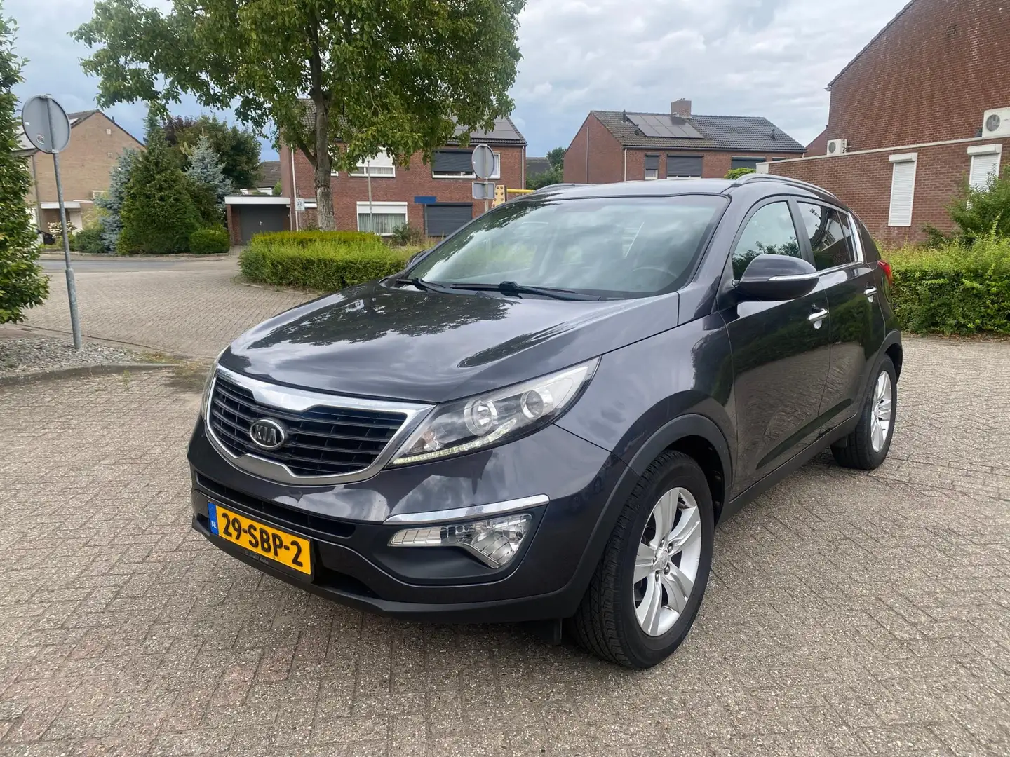 Kia Sportage 1.6 GDI X-ecutive Plus Pack Grijs - 1