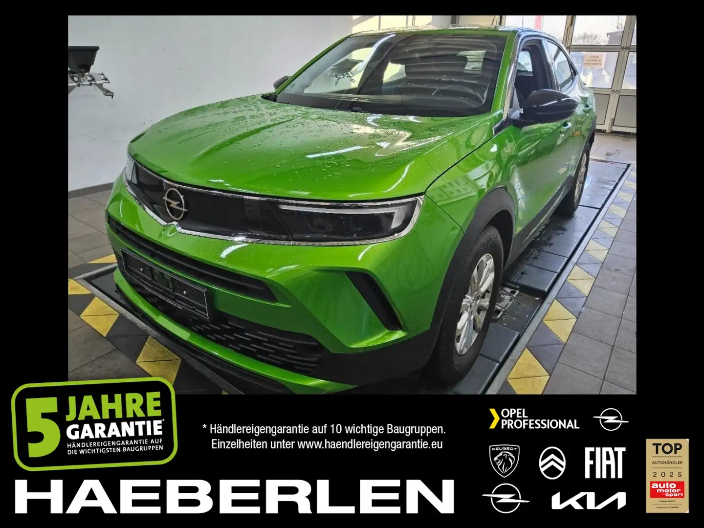 Opel Mokka-E Mokka e Edition LED+Fernlichtass.+KlimaA+LM+AUT Verde - 1