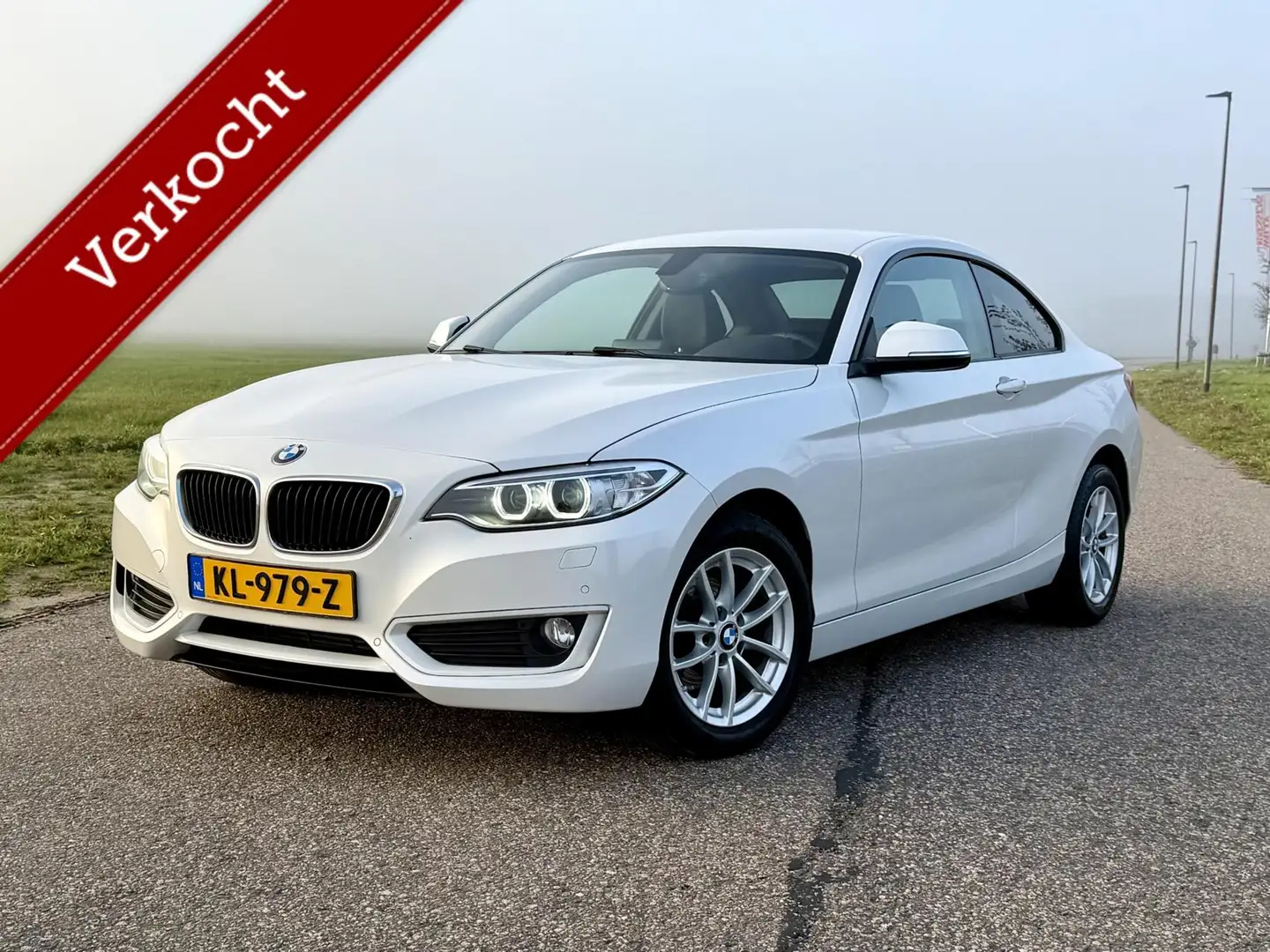 BMW 218 2-serie Coupé 218i Essent | Navi | Leer | Navi GAR Weiß - 1