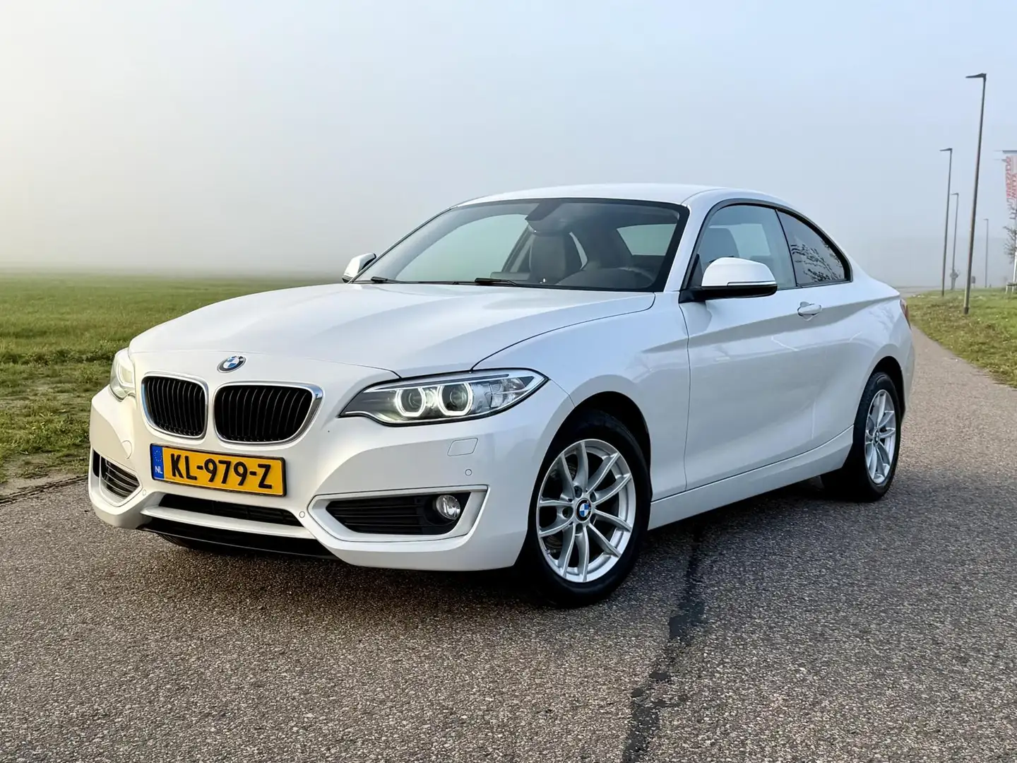 BMW 218 2-serie Coupé 218i Essent | Navi | Leer | Navi GAR Blanc - 1
