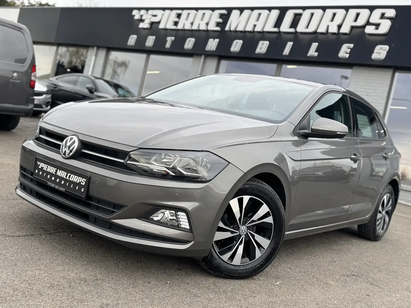 Volkswagen Polo 1.0i Comfortline / NAV / CARPLAY / AIRCO Grijs - 1