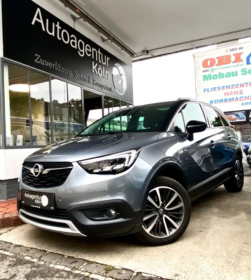 Opel Crossland X Innovation *PANO*SHZ*NAVI*1-J GAR Grau - 1