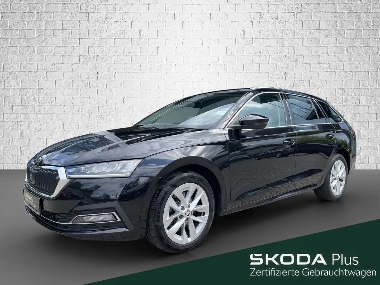 Skoda Octavia Combi 2.0 TDI DSG 4x4 Style ACC DCC AHK Noir - 1
