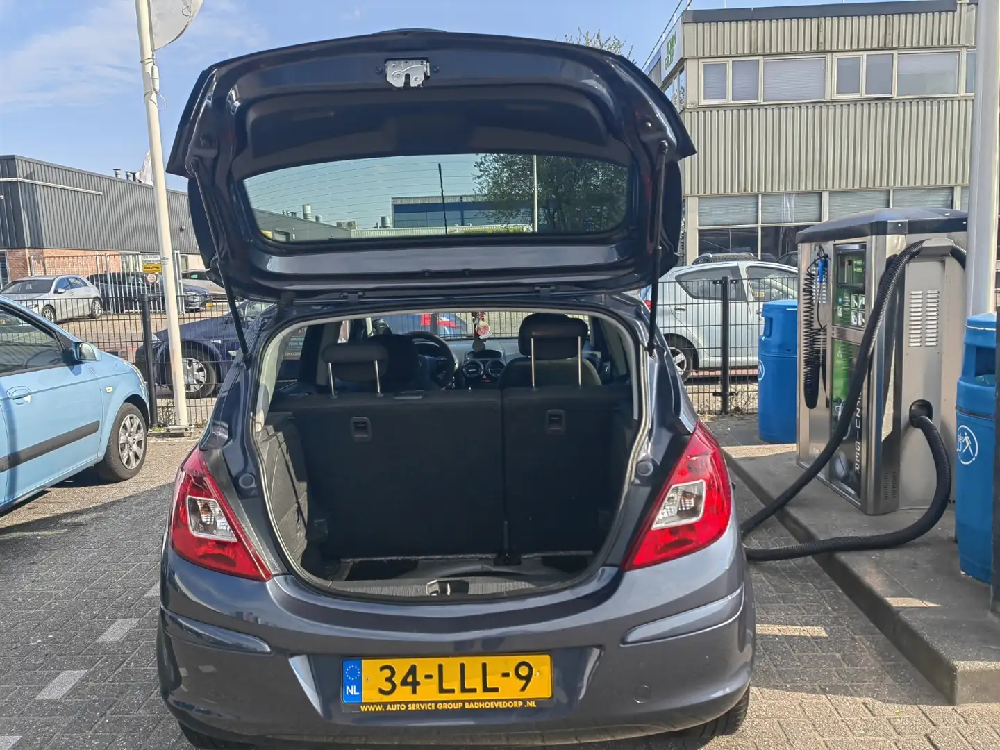 Opel Corsa 1.4 16V Sport Blauw - 1