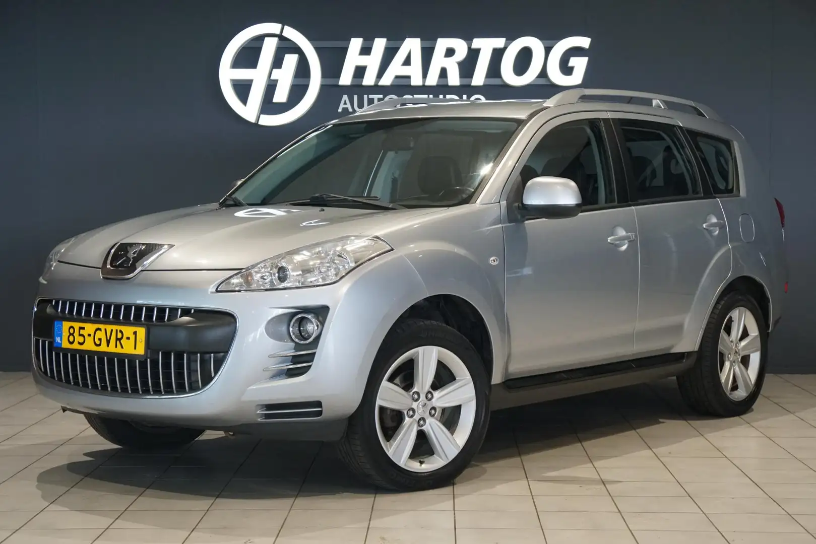 Peugeot 4007 2.4 ST 7p. + 4WD / TREKHAAK / NAVIGATIE / CRUISE C Gris - 1