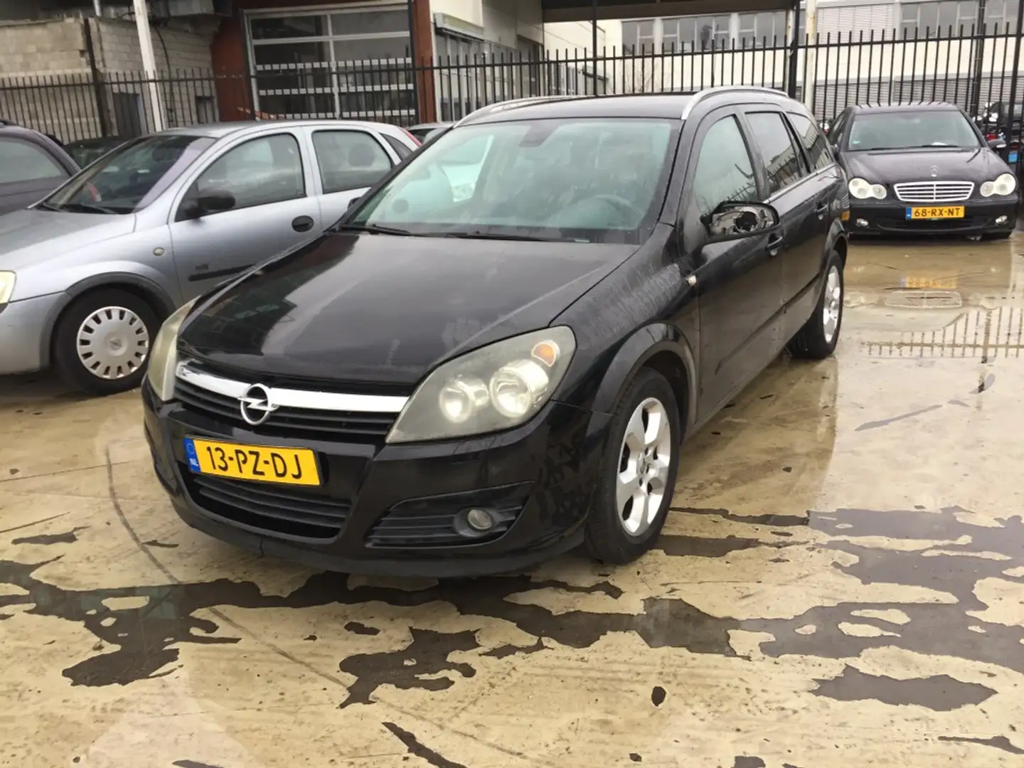 Opel Astra 1.6 Cosmo Zwart - 1