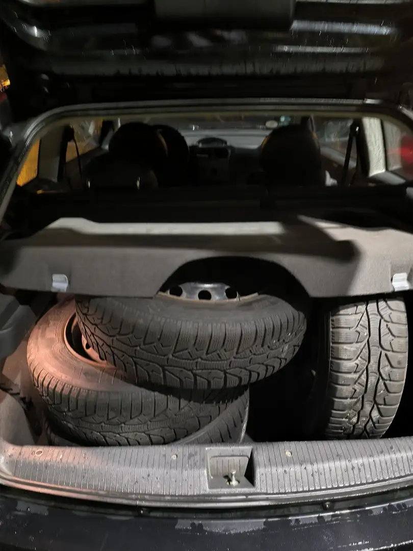 Opel Corsa 1.2 16V Schwarz - 1