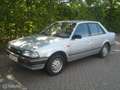 Mazda 323 1.5 GLX 4 drs. sedan Gris - thumbnail 4