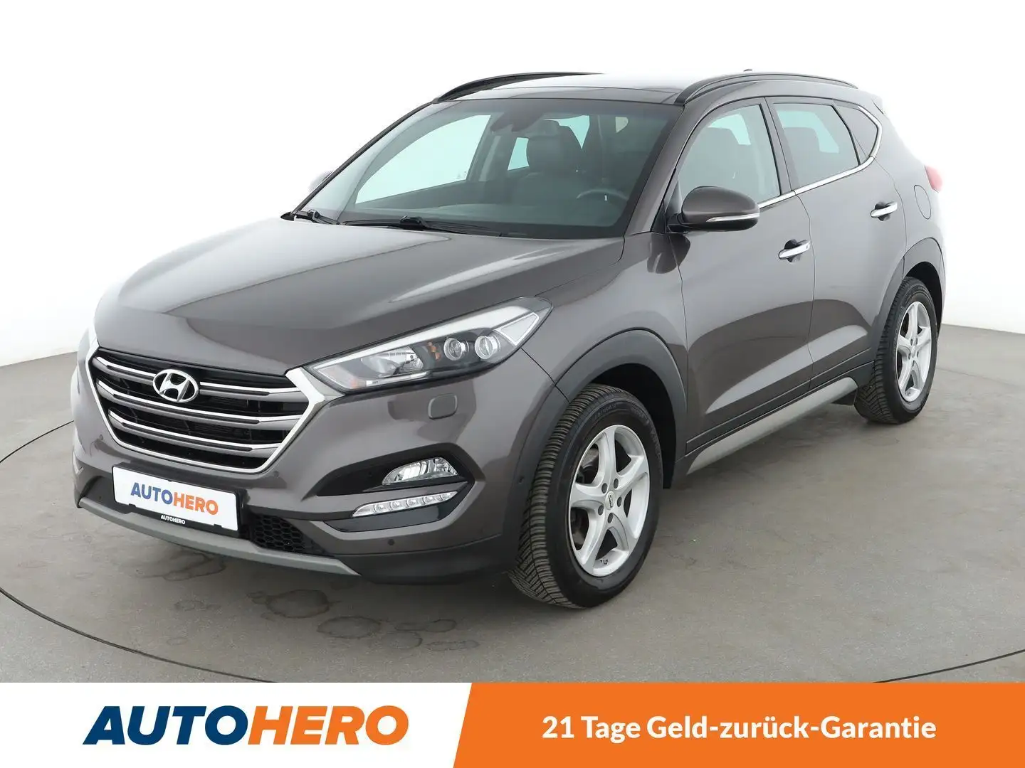 Hyundai TUCSON 1.6 TGDI Premium 4WD Aut.*NAVI*TEMPO*CAM*PDC*SHZ* Braun - 1