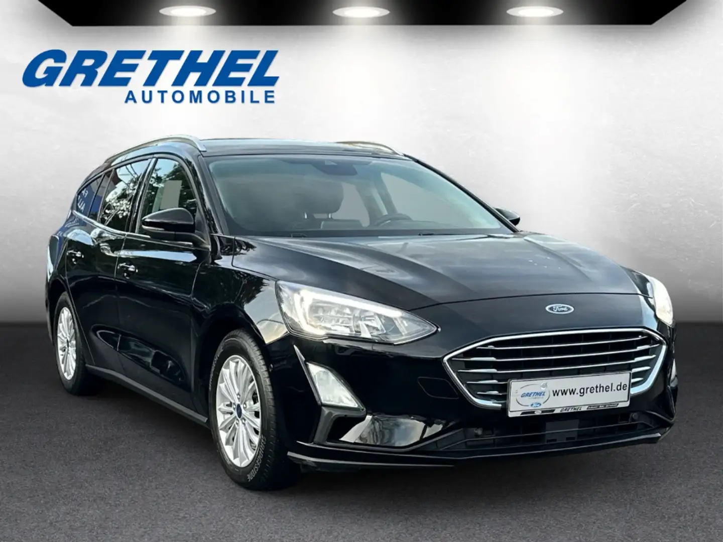 Ford Focus Turnier Titanium AHK-klappbar El. Panodach Navi LE Schwarz - 1