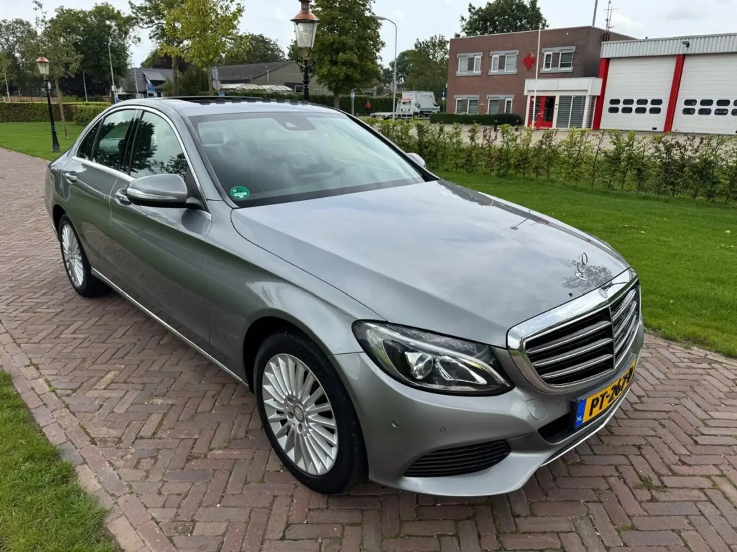 Mercedes-Benz C 180 Automaat 1e eigenaar, zeer goed onderhouden Grijs - 1
