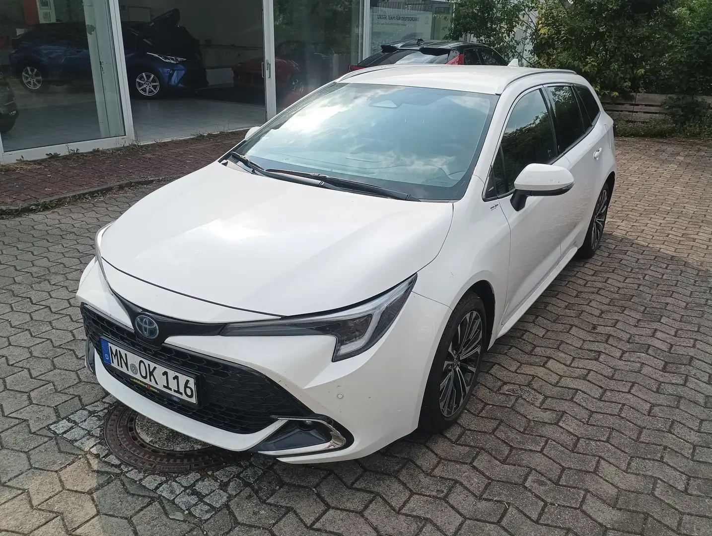 Toyota Corolla 1.8 Hybrid Touring Sports Team Deutschland Bianco - 1