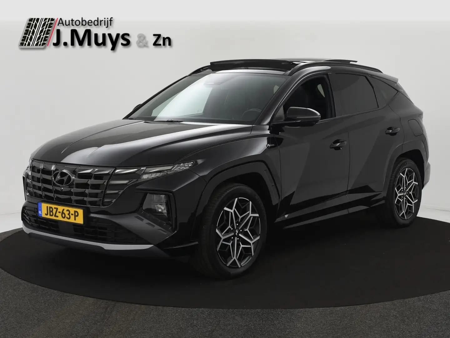 Hyundai TUCSON 1.6 T-GDI 265PK PHEV N Line Sky 4WD PANODAK|STOELV Zwart - 1