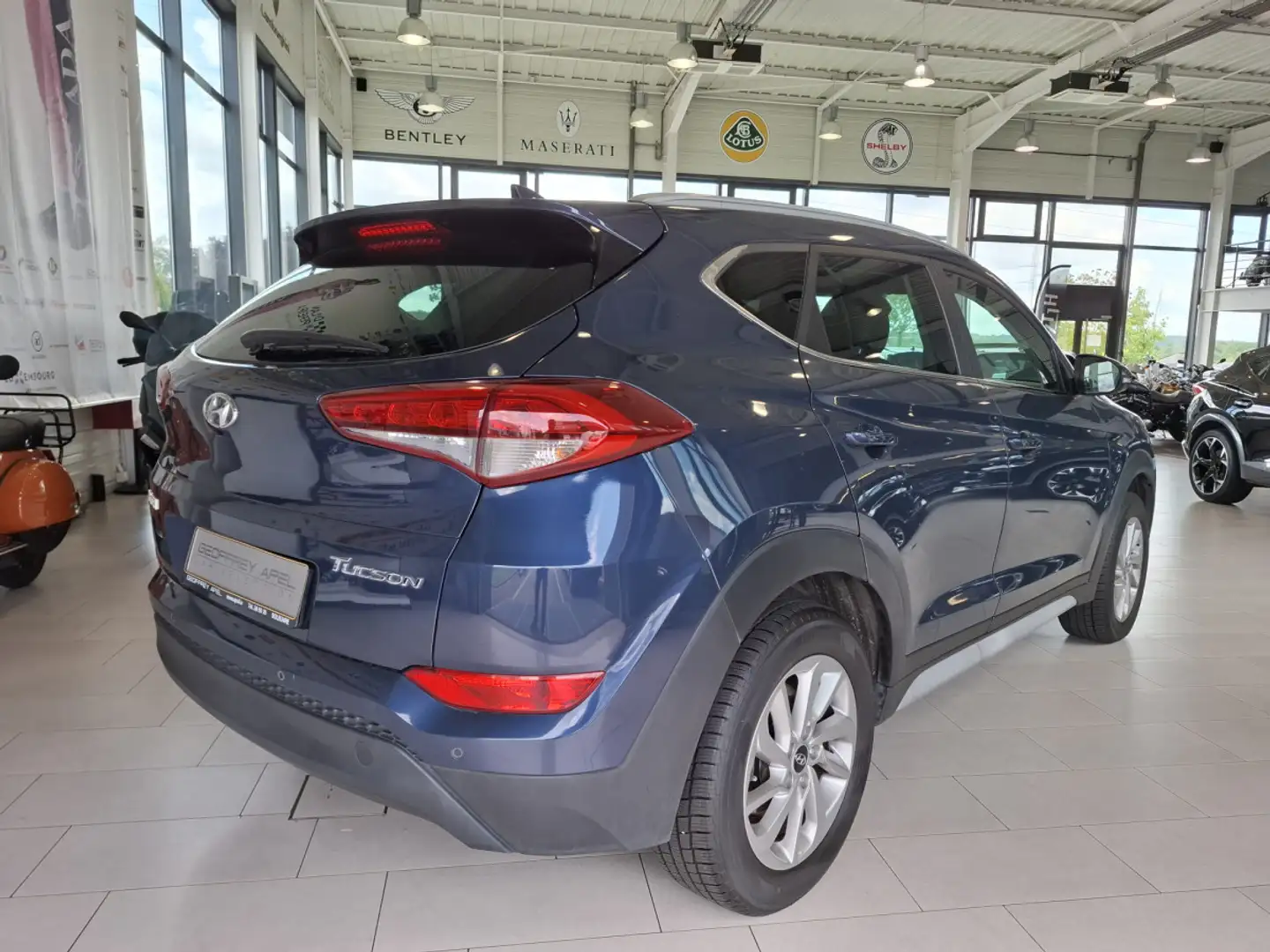 Hyundai TUCSON 1.6 GDI 2WD CUIR NAVI 1 HAND Bleu - 2