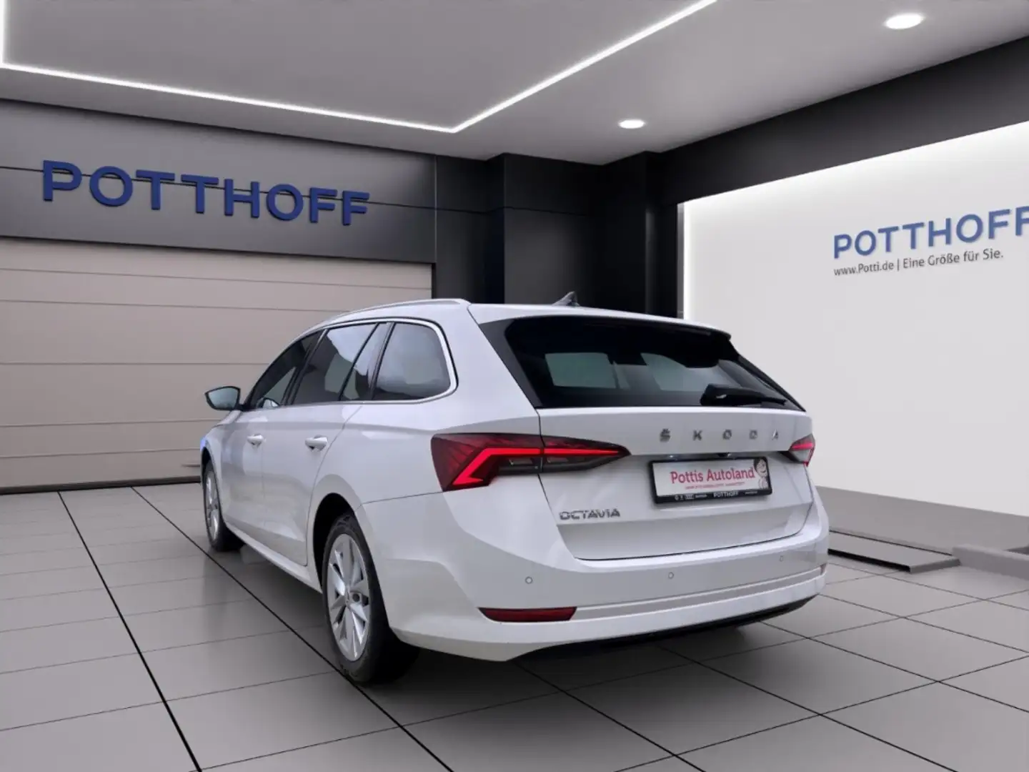 Skoda Octavia Combi 2.0 TDI STYLE NAVI ACC KAMERA HuD Weiß - 2