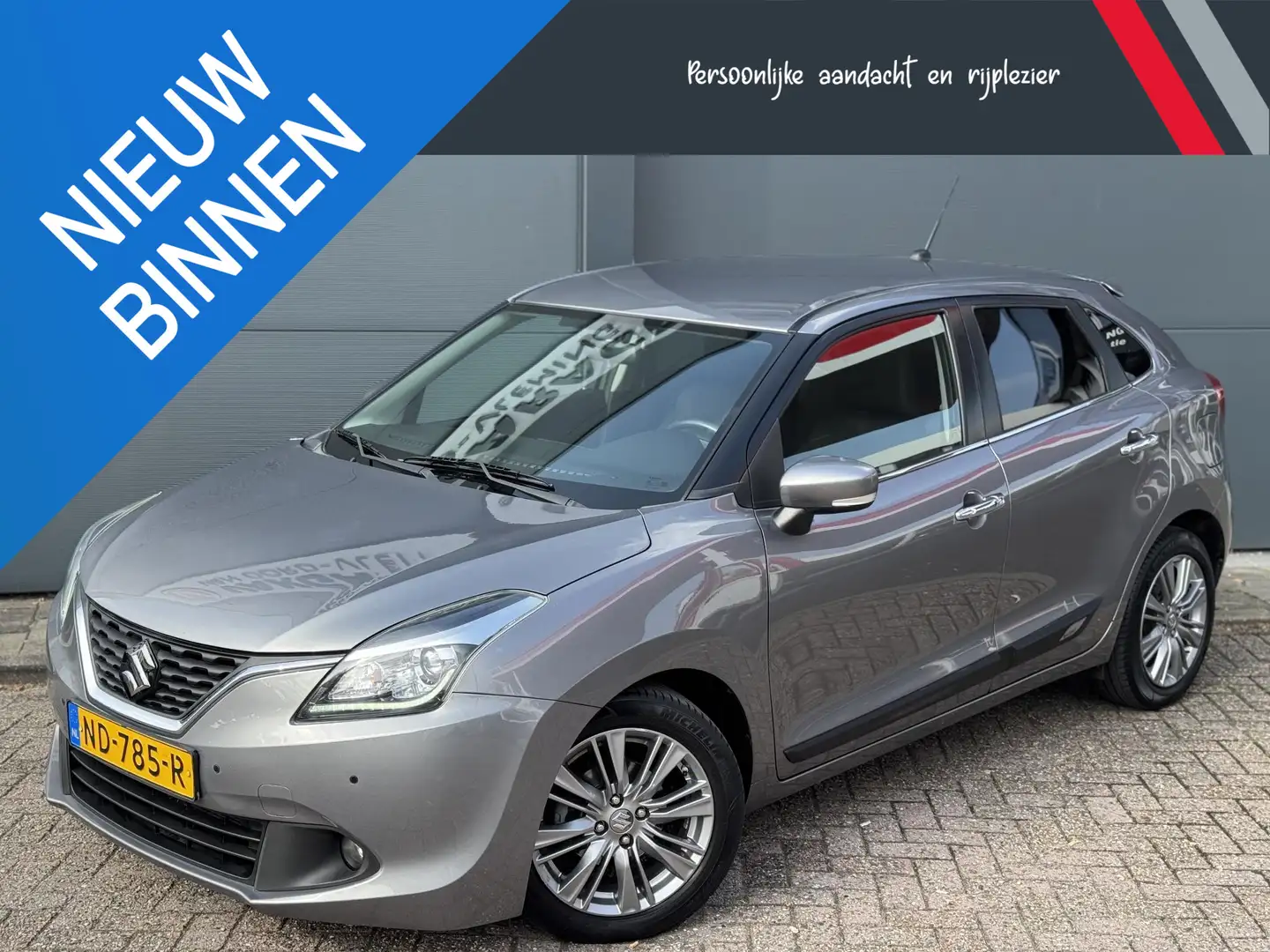 Suzuki Baleno 1.0 Boosterjet High Executive / 100 % Onderhoud Gris - 1
