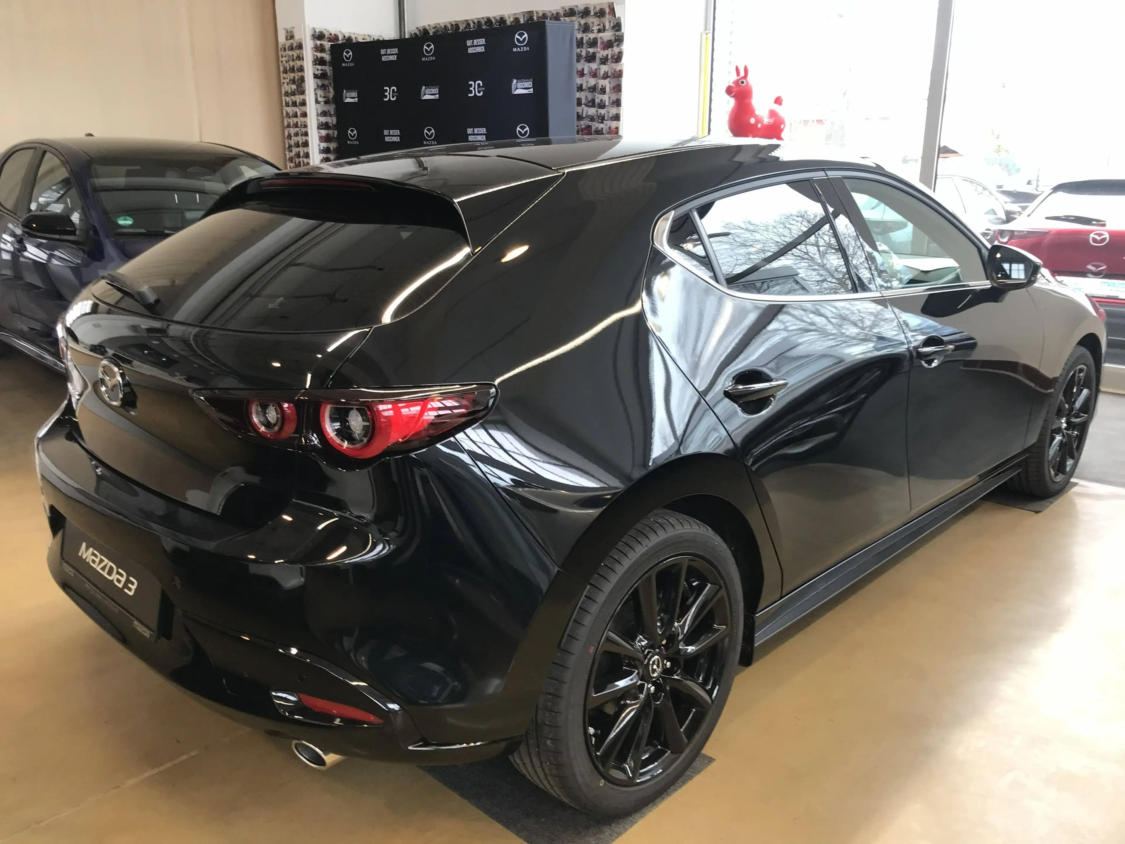 Mazda 3 2.5L e-SKYACTIV G 140ps 6AT HOMURA — photo 4