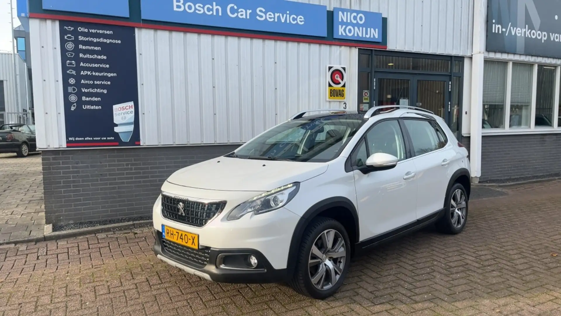 Peugeot 2008 1.2 PureTech Allure Wit - 1