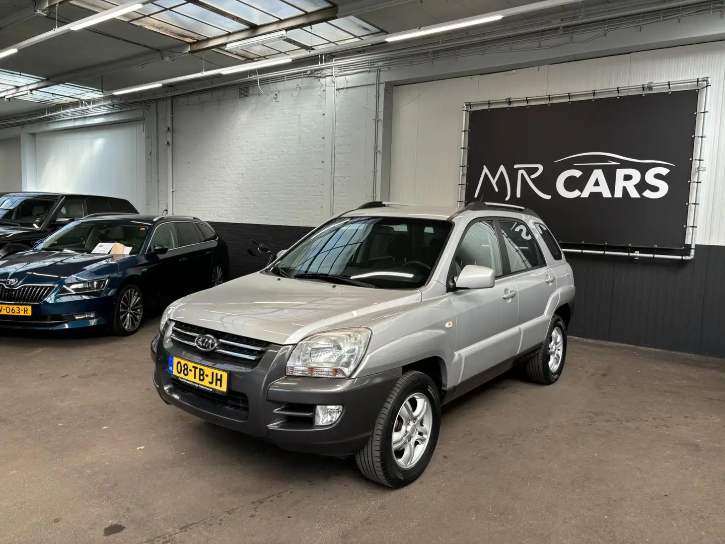 Kia Sportage 2.0 CVVT Comfort Airco/Cruise Control Grijs - 2