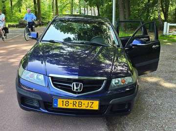Tourer 2.0 i Executive