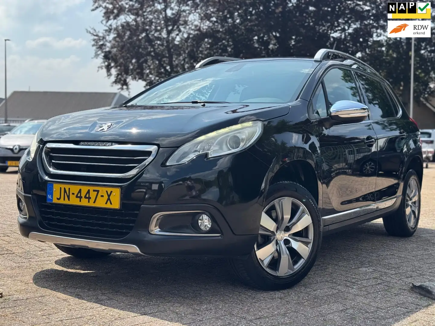 Peugeot 2008 1.2 PureTech Allure PANORAMA DAK NAVIGATIE CLIMA N Noir - 1