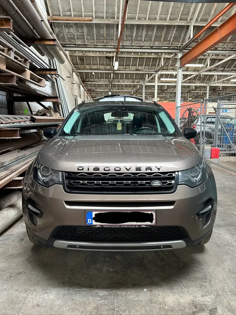 Land Rover Discovery Sport TD4 HSE Luxury Brons - 1