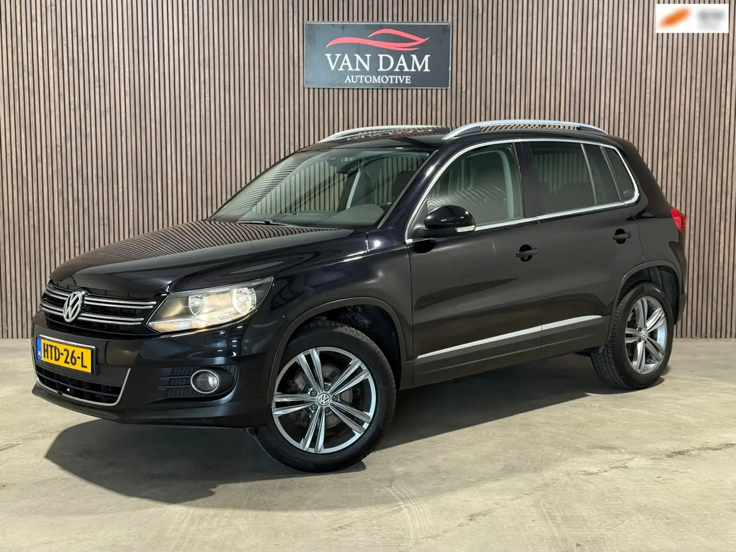 Volkswagen Tiguan 2.0 TSI Sport&Style 4Motion DSG 2012 CAR-PLAY Zwart - 1