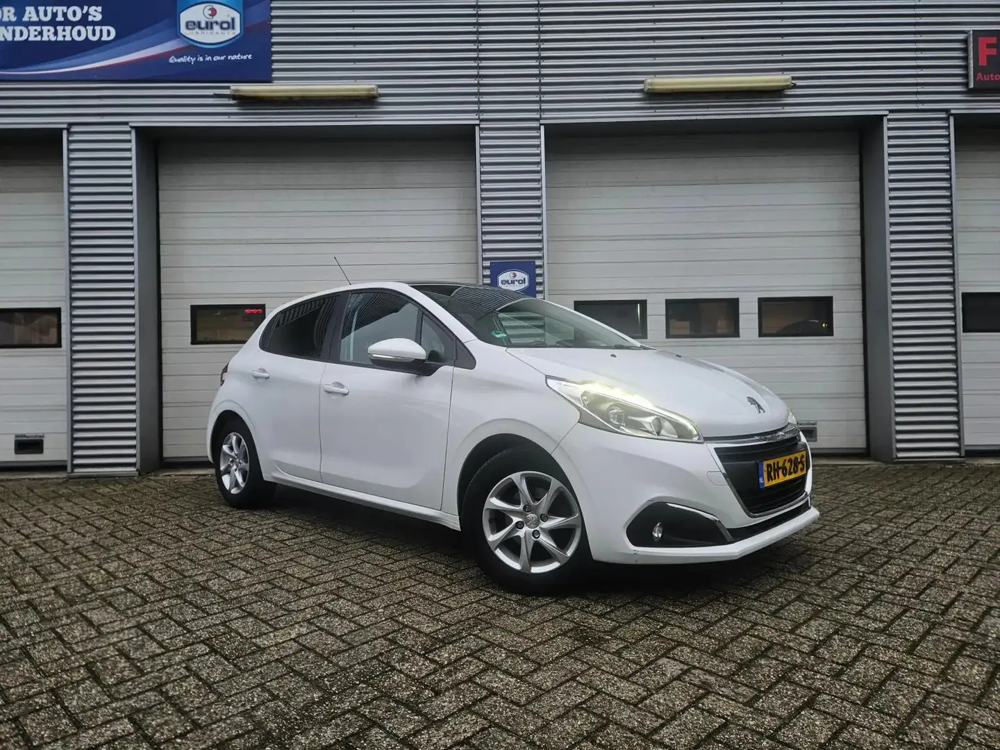 Peugeot 208 1.2 PureTech Allure Wit - 1
