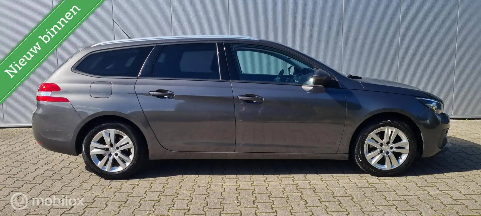 Peugeot 308 SW 1.2 PureTech Allure PANO/NAP/PARKEERSENSOREN Grijs - 2