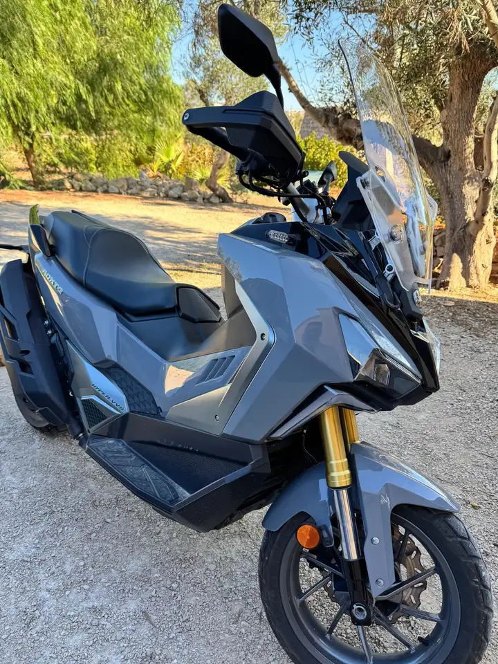 Sym ADX 400