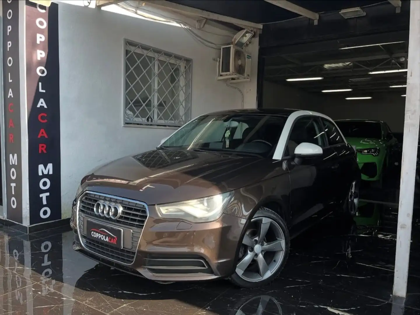 Audi A1 2012 3p 1.6 tdi Attraction c/clima 105cv - 1