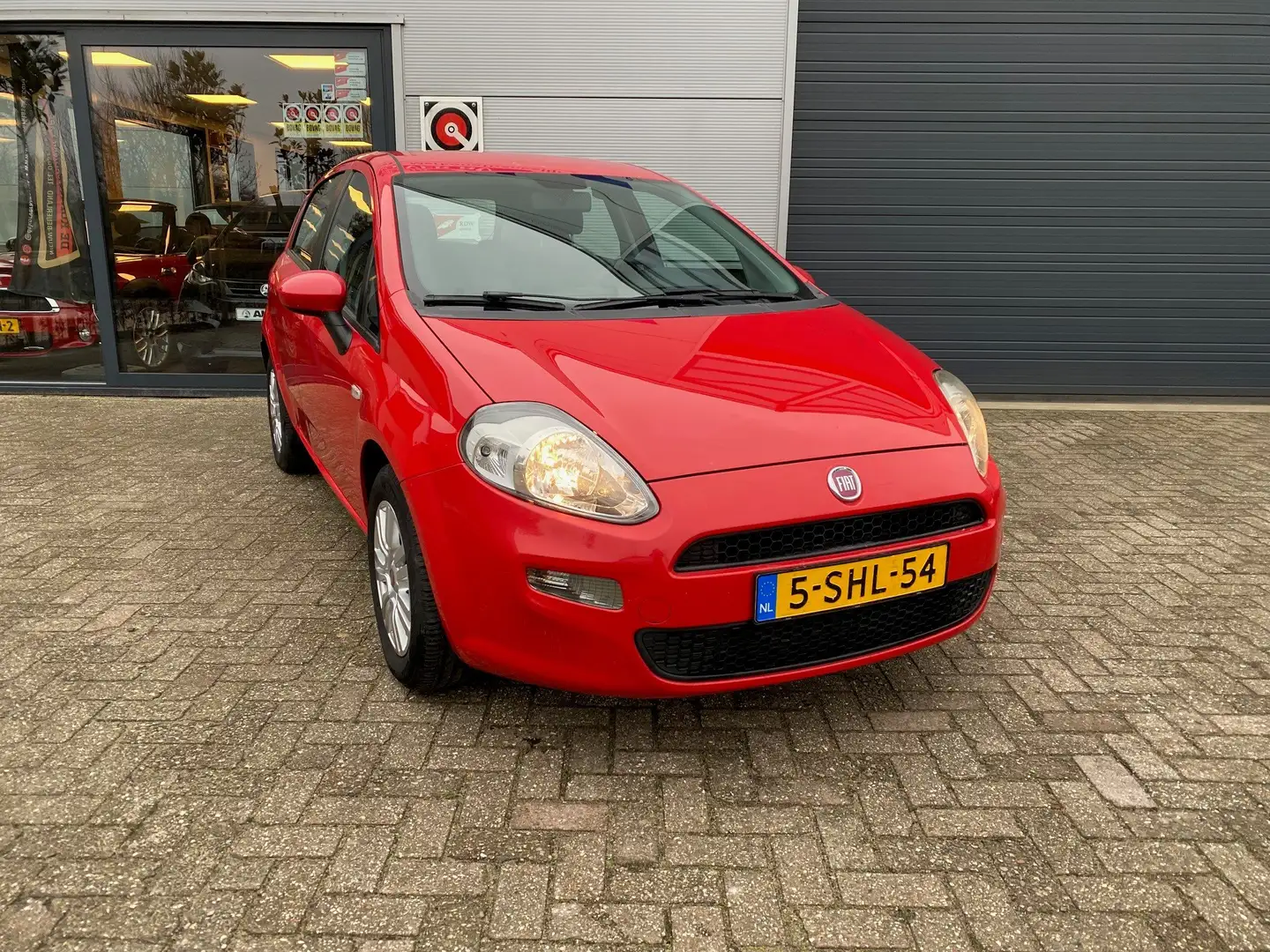 Fiat Punto 0.9 TwinAir Pop Inc. nieuwe APK Rot - 1