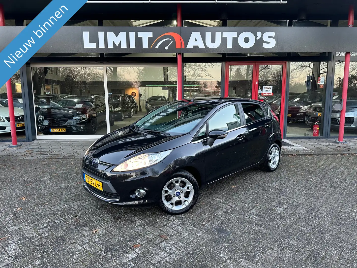 Ford Fiesta 1.25 Titanium Climate/Cruise/Pdc/Lmv/5drs/Apk/Nap Zwart - 1