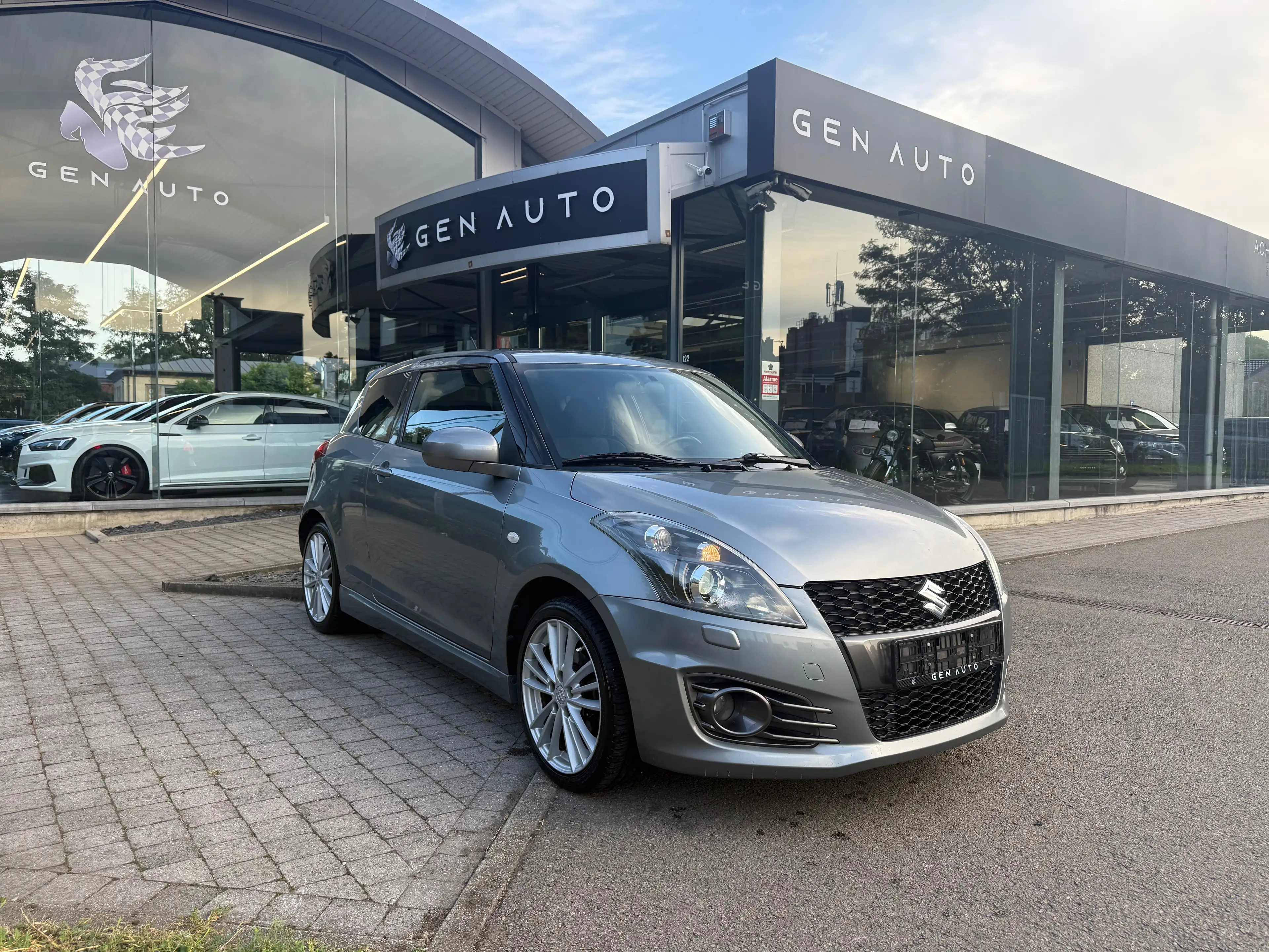 Suzuki Swift Sport 1.6i Xenon Airco Cruise Control Bluetooth * 12 MOIS GARANTIE *