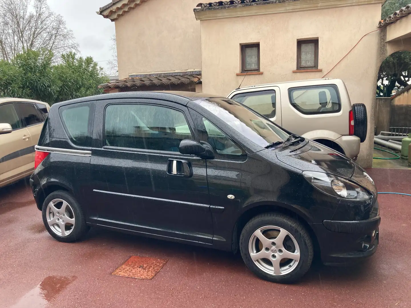 Peugeot 1007 1.6 HDi 16v FAP Sporty Pack Negru - 1