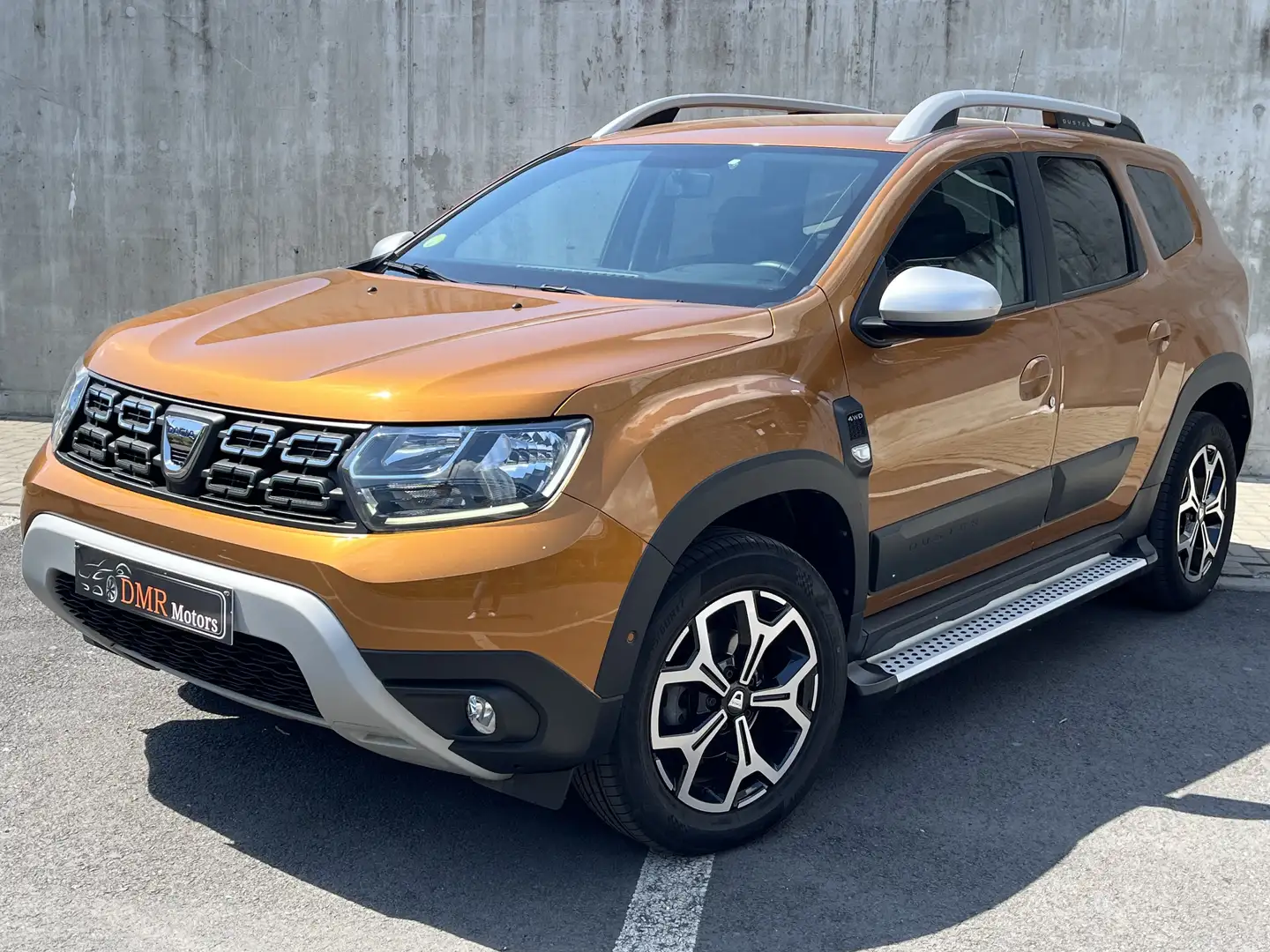 Dacia Duster 1.5 Blue dCi 4x4 Prestige Euro6d/Caméra/Navi Oranje - 1