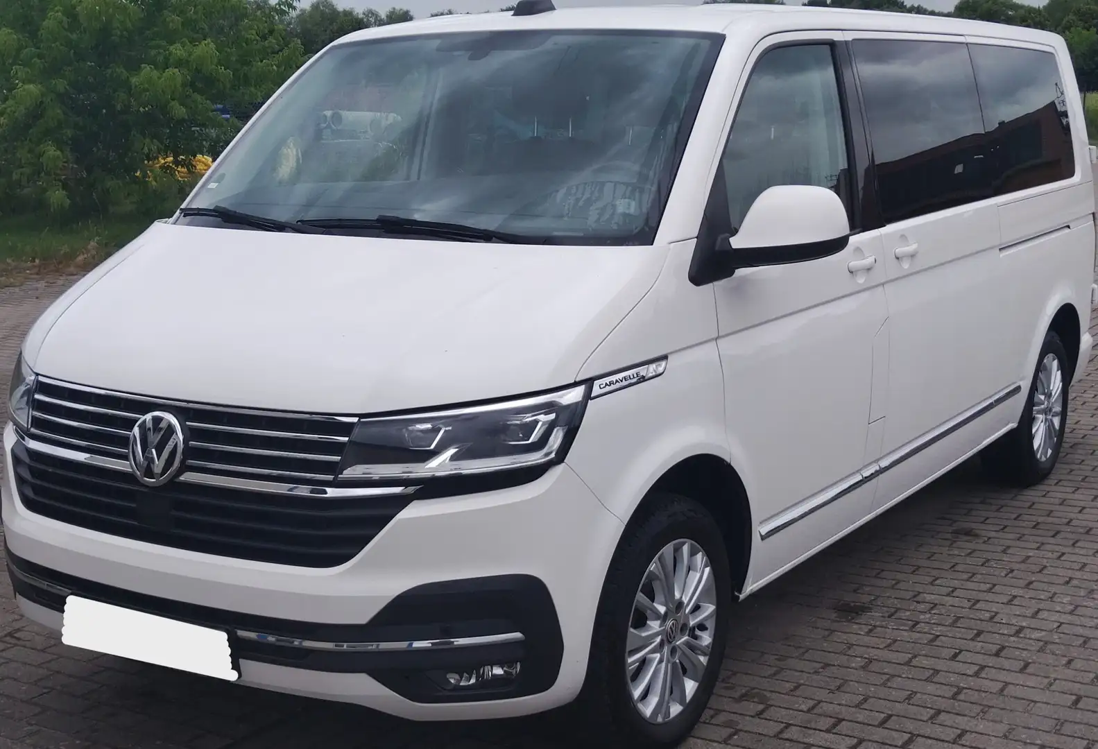 Volkswagen T6.1 Caravelle DSG lang HighLine Weiß - 1