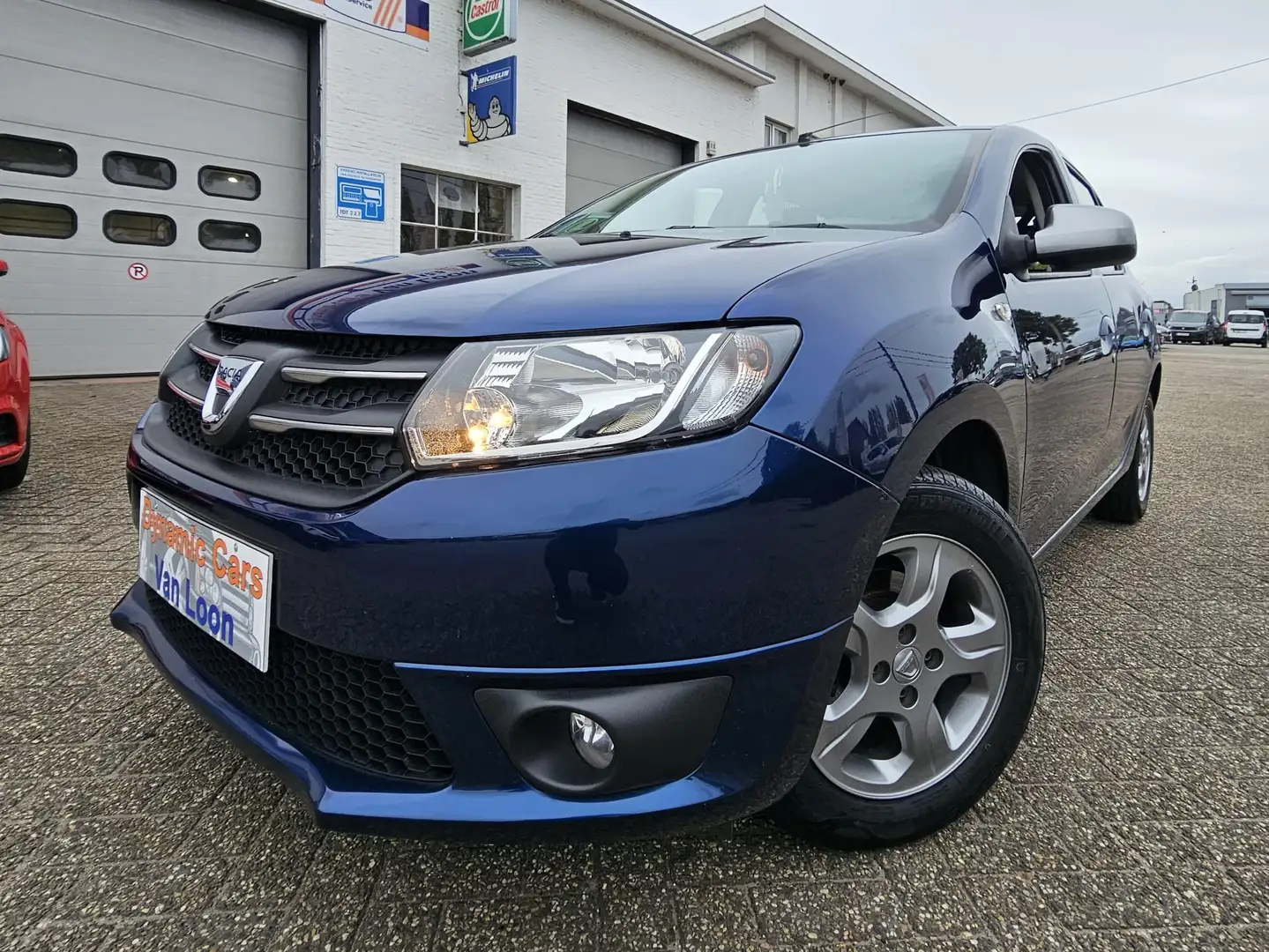 Dacia Sandero 1.2 16V, Airco, Bluetooth, Navi, Trekhaak, Cruise. Blau - 1