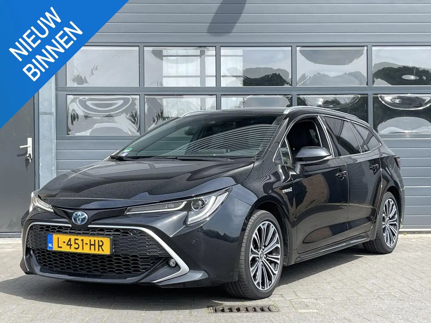 Toyota Corolla TOURING SPORTS 1.8 HYBRID EXECUTIVE I TREKHAAK I A Zwart - 1