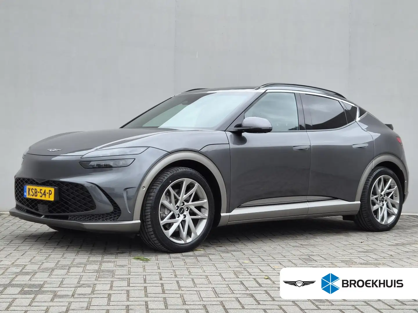 Genesis GV60 Long Range Sport 74 kWh AWD / SOH 98% / Fabrieksga Grau - 1