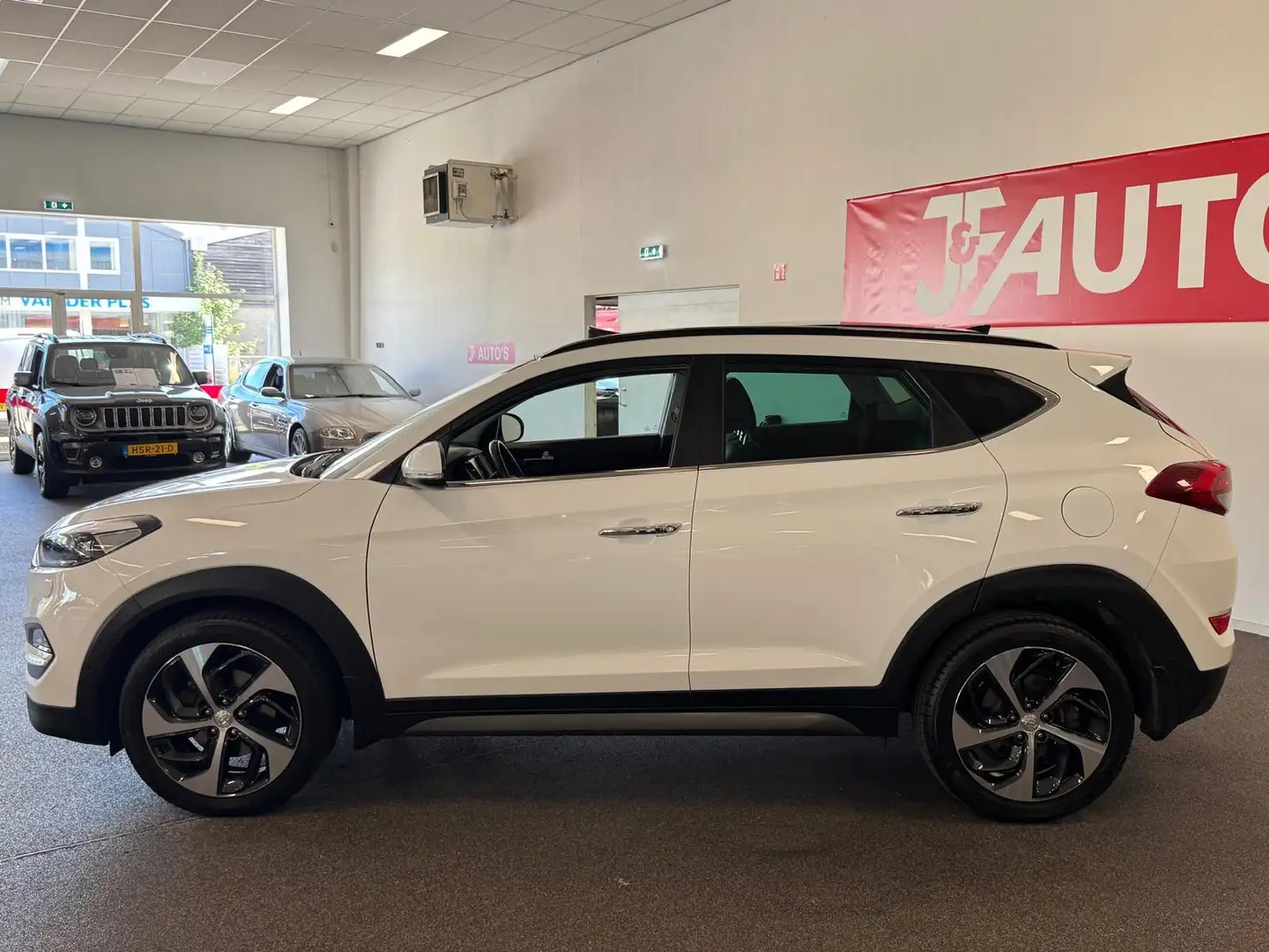 Hyundai TUCSON 1.6 T-GDi Premium 4WD PANORAMADAK, NAVIGATIE/CAMER Wit - 2