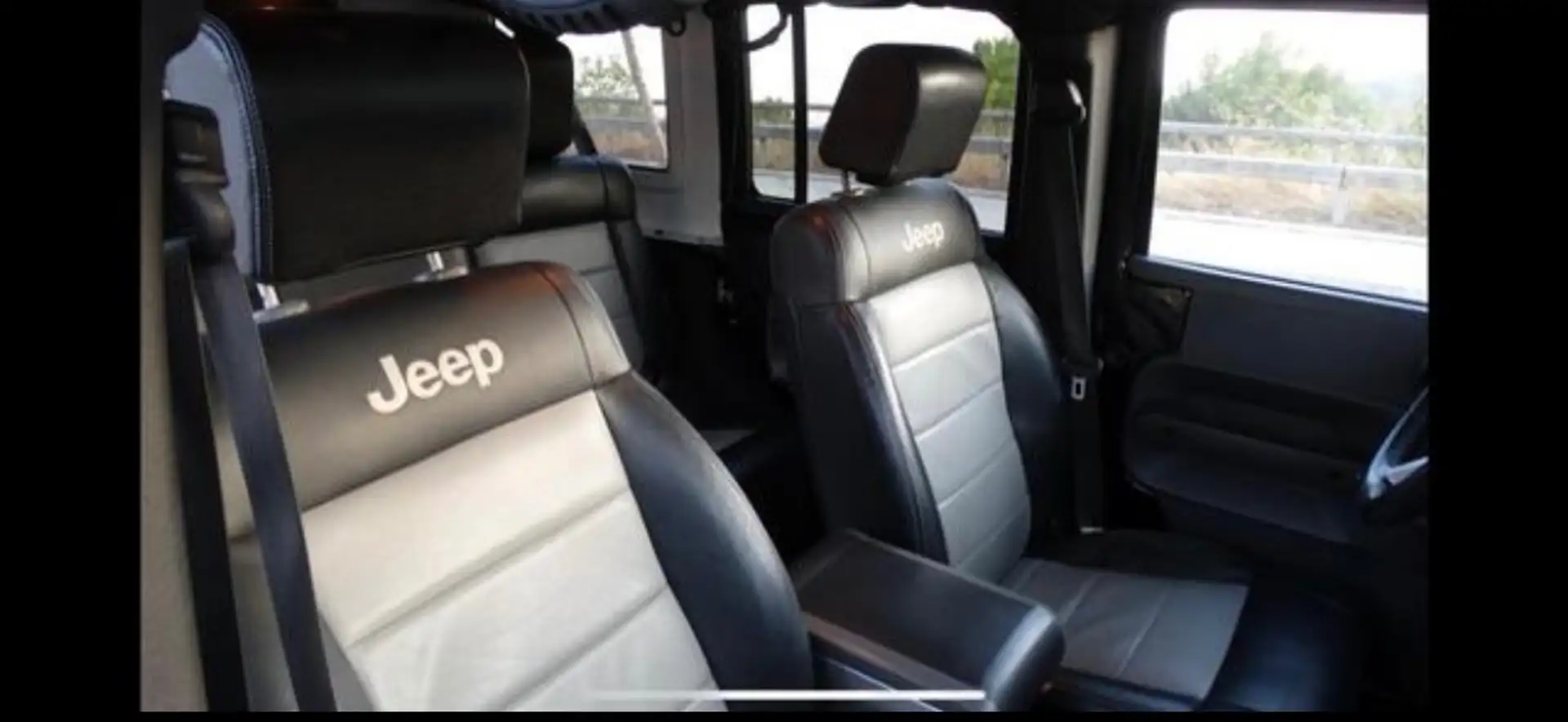 Jeep Wrangler Wrangler 3.8 V6 Sáhara Unlimited Negro - 1