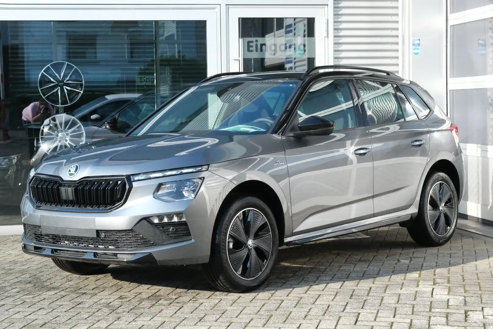 Skoda Kamiq Monte Carlo 1.0 TSI DSG AHK Matrix Panodach Kam... Grijs - 1
