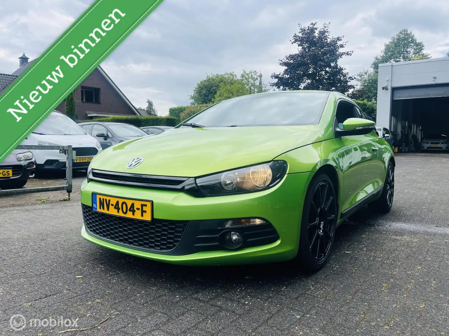 Volkswagen Scirocco 1.4 TSI 19" LM / Clima / Audio / APK 06-2026 Groen - 1