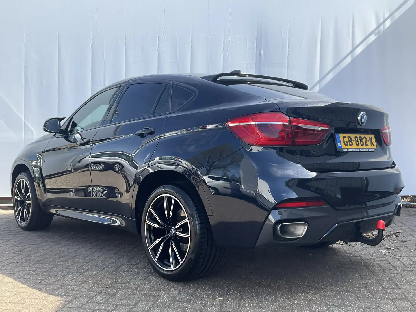 BMW X6 xDrive30d High Executive M-Sport Pano Trekhaak HUD Zwart - 2