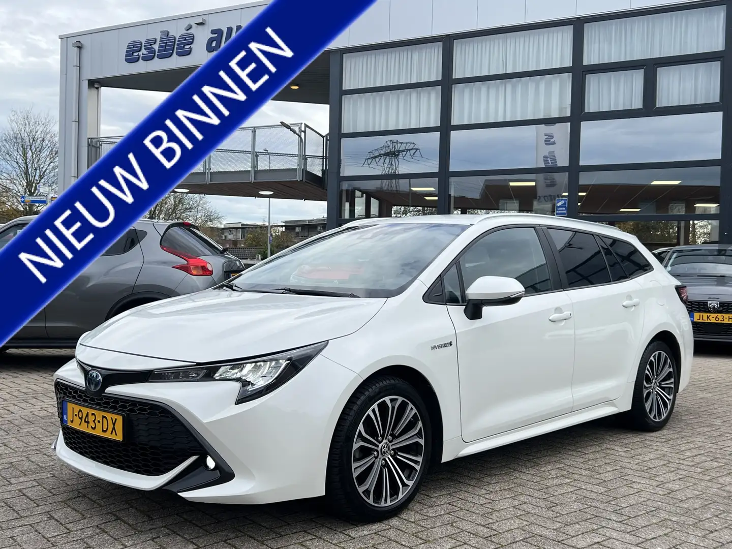 Toyota Corolla Touring Sports 1.8 Hybrid Business Plus Navigatie* Blanco - 1