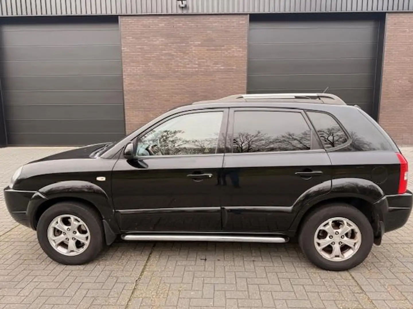 Hyundai TUCSON 2.0i Style Supreme | LEER| AIRCO| CLIMA| LICHT MET Noir - 2