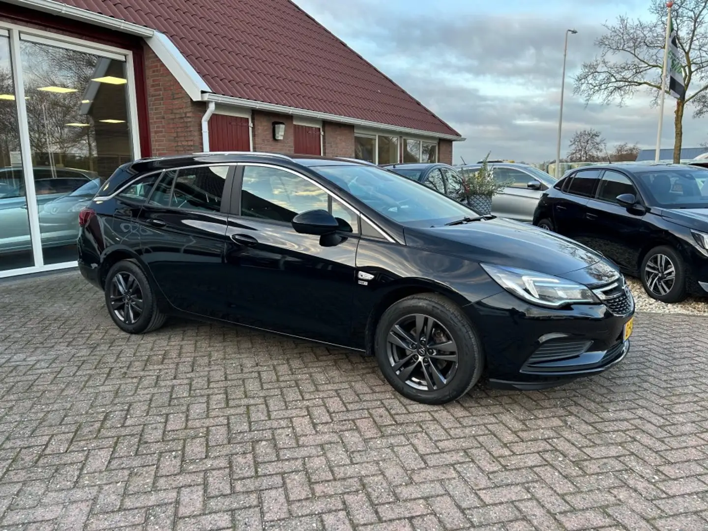 Opel Astra 1.0 TURBO 120 JAAR EDITION WAGON TREKHAAK/NAVI/CRU Noir - 1