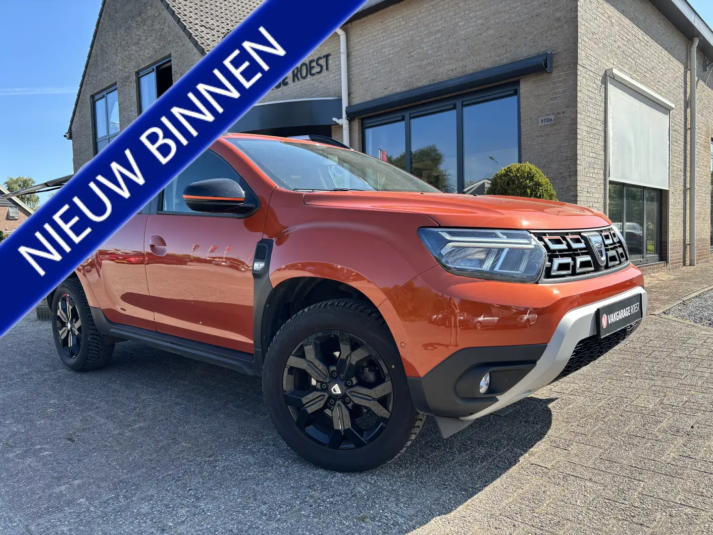 Dacia Duster 1.3 TCe Extreme Trekhaak / 360-Camera / All-Season Orange - 1